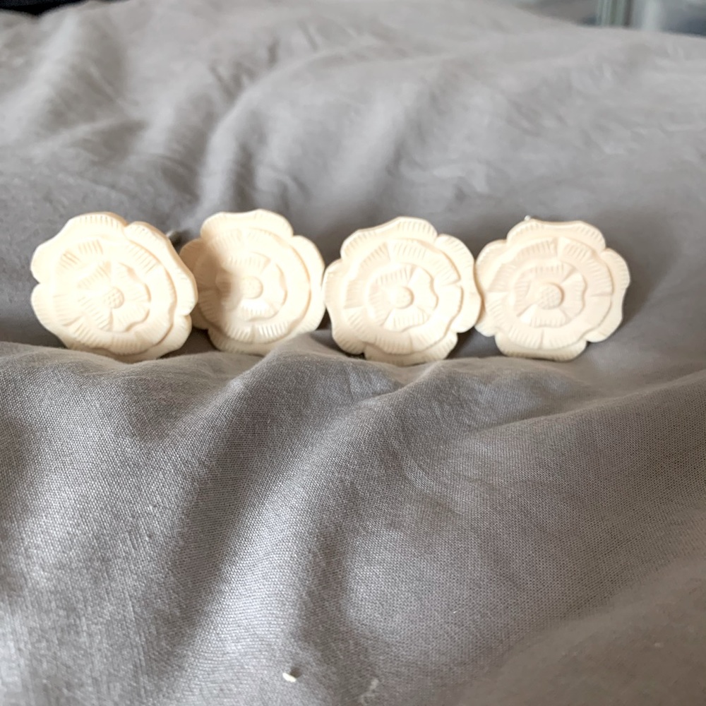Ivory drawer pulls (4).